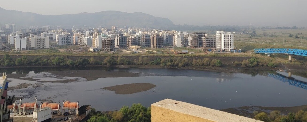 Sai Nagar_a large body of water surrounded by buildings